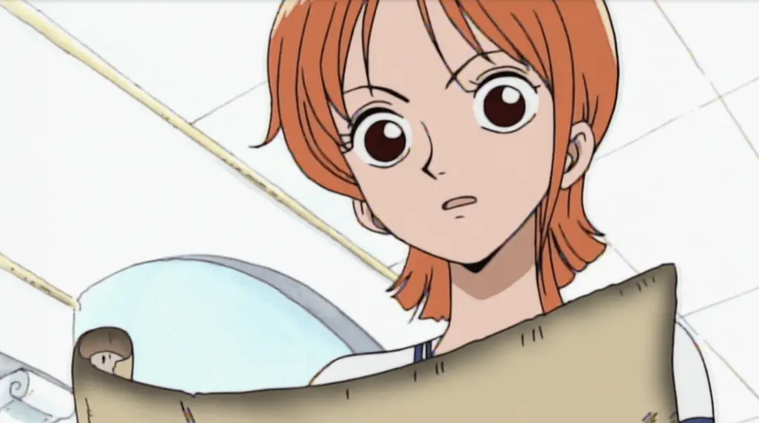 Nami studies a map - One Piece on Crunchyroll - Eiichiro Oda / Shueisha, Fuji TV, Toei Animation