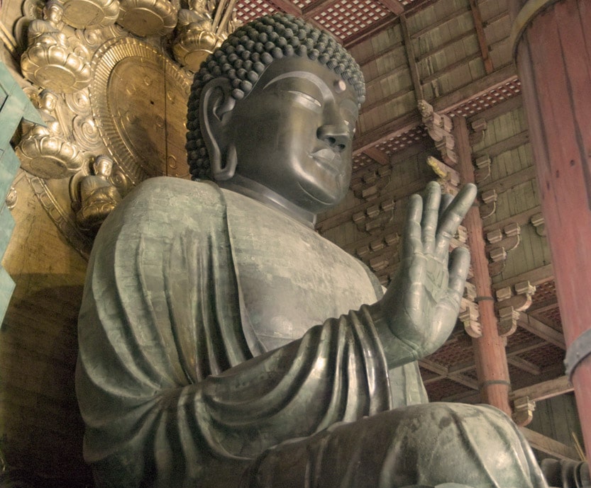 Public domain photo cropped) by Frank "Fg2" Gualtieri, found at Wikimedia Commons: The Daibutsu (Great Buddha) at Todaiji, Nara.