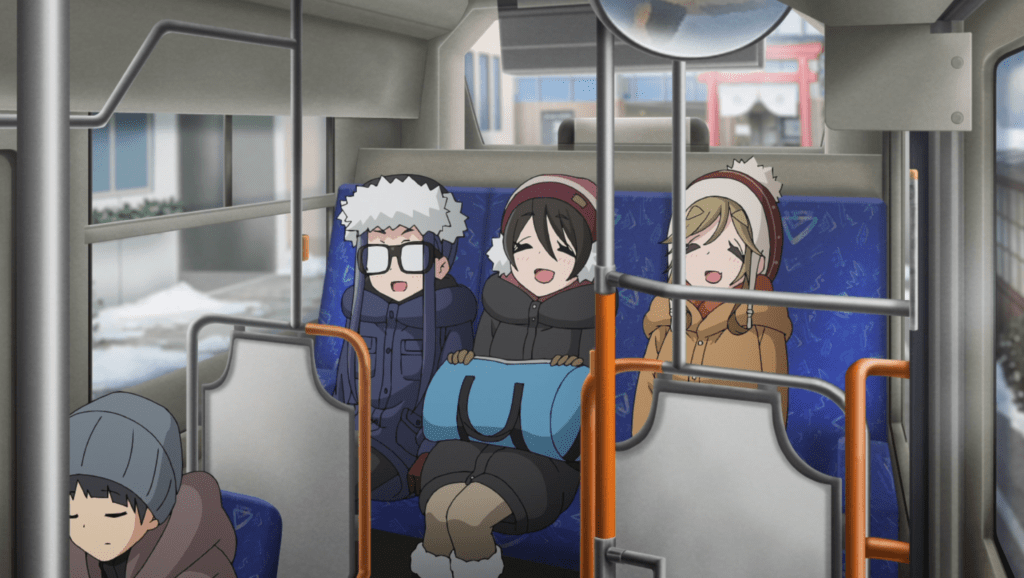 Chiaki, Ena, and Aoi on the shuttle bus - Laid-Back Camp/ Yuru Camp at Crunchyroll - Afro Houbunsha/ Outdoor Activity Project